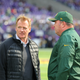 NFL Commissioner Roger Goodell and Green Bay Packers head coach Mike McCarthy talk during warmups Oct. 15, 2017, at U.S. Bank Stadium in Minneapolis. (Adam Bettcher/Getty Images)